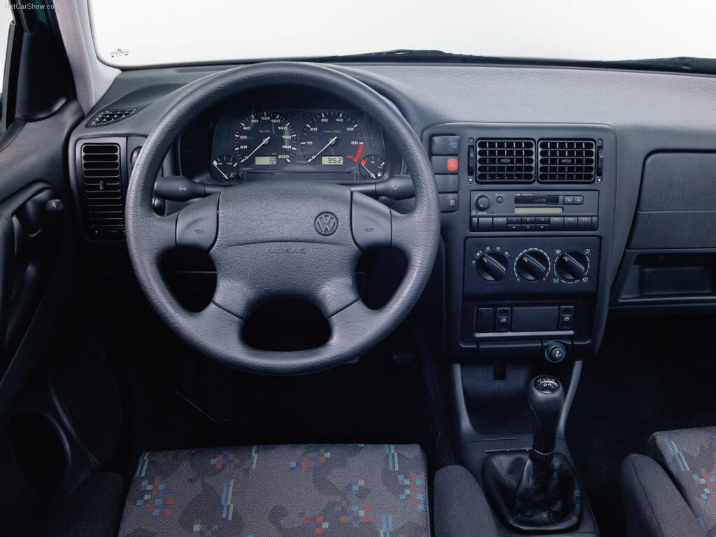 Interior view of a Volkswagen vehicle dashboard featuring components connected by MD ELEKTRONIK's advanced automotive wiring solutions.