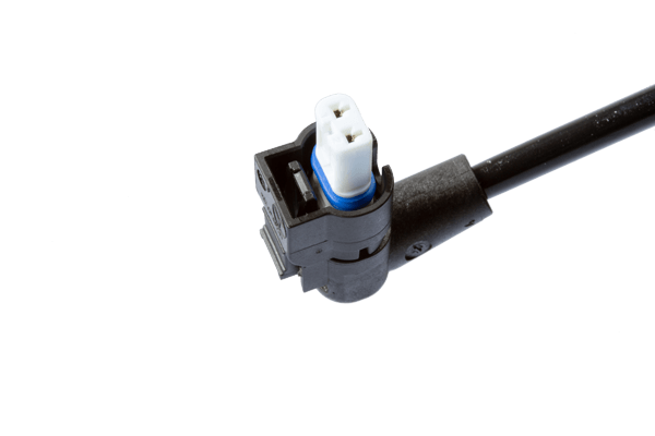 Automotive speed sensor with modern connector, showcasing MD ELEKTRONIK's expertise in precision-engineered vehicle data transmission components designed for reliability and performance.